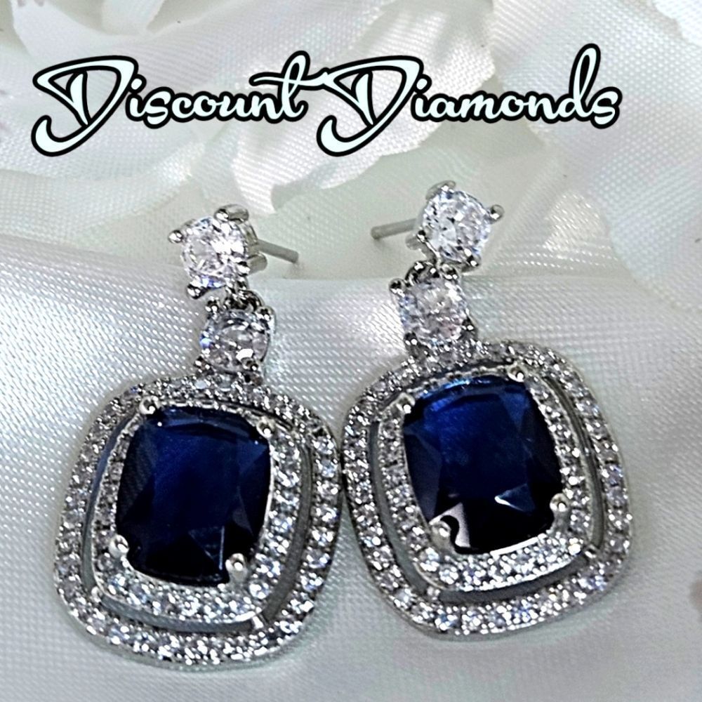Blue Halo 5.80 Ct. Sapphire & White Baguette Diamond Earrings on 925 Silver
